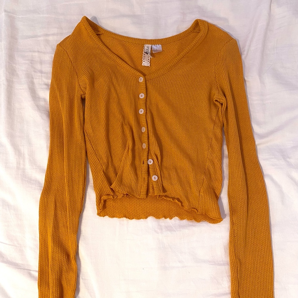 yellow cardigan